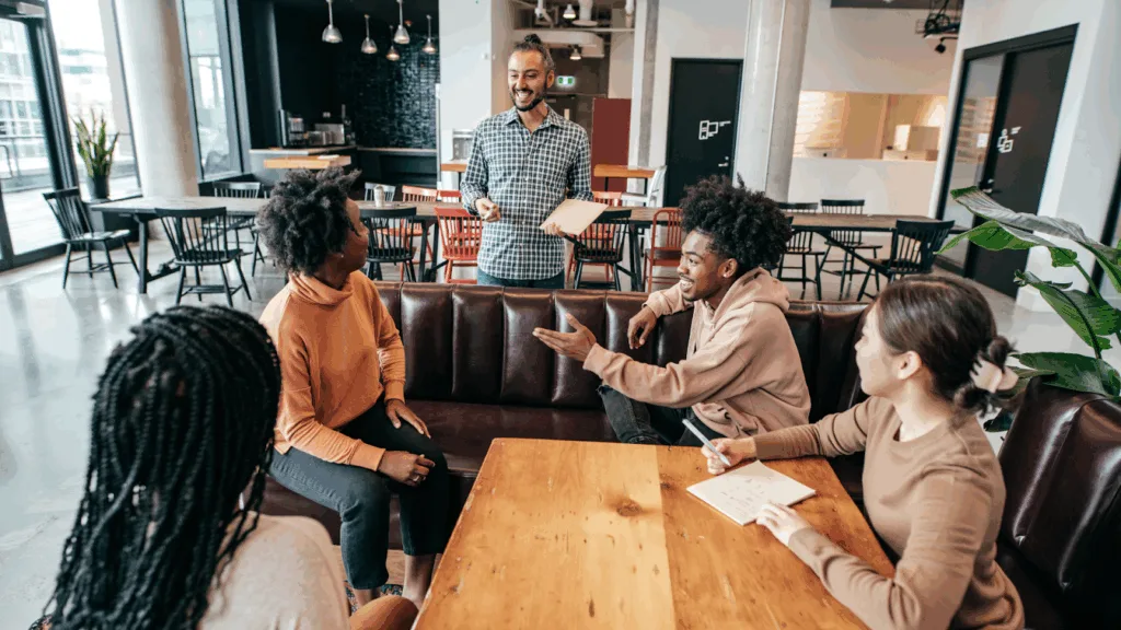 Brand team collaborating with influencers for campaign ideas.