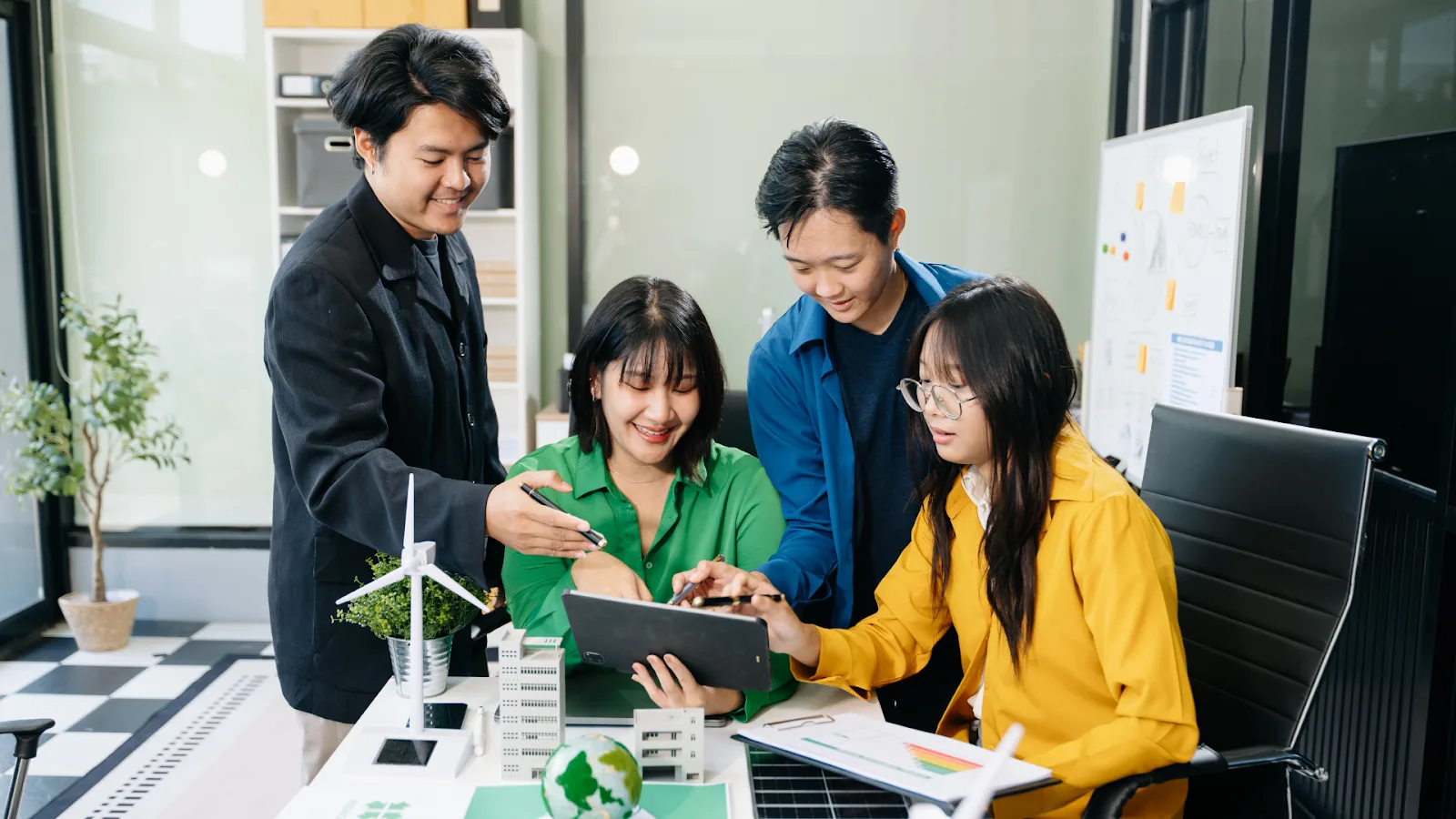 Creative team planning cannabis influencer partnerships for a brand campaign