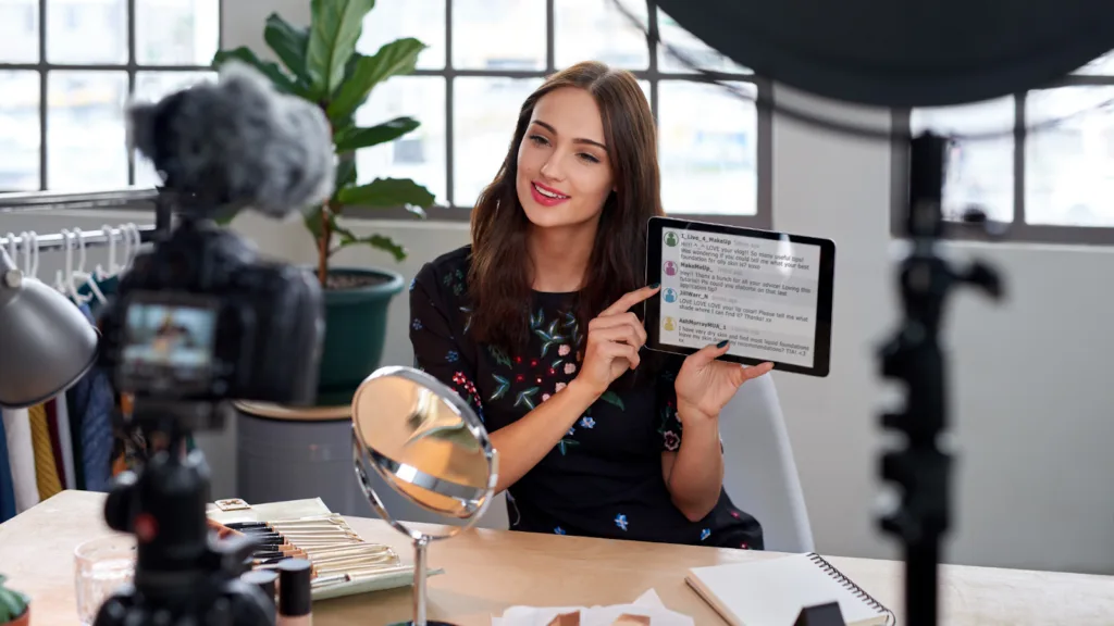Digital creator filming a product discussion video used in cannabis influencer marketing